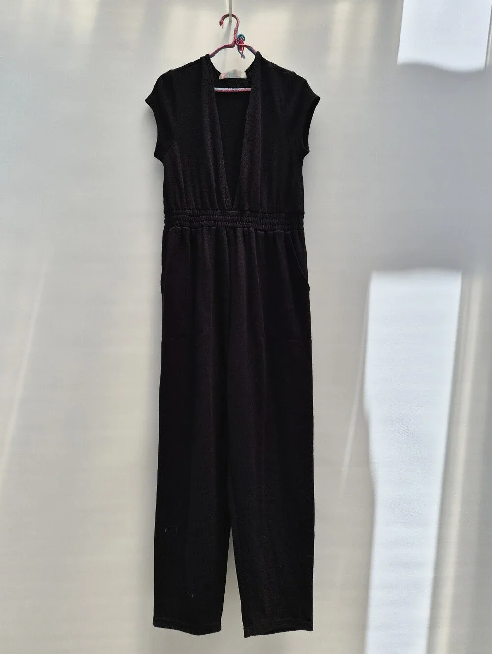 Free People Beach Rita Jumpsuit M Black Terry Knit Deep V Minimalist Resortwear